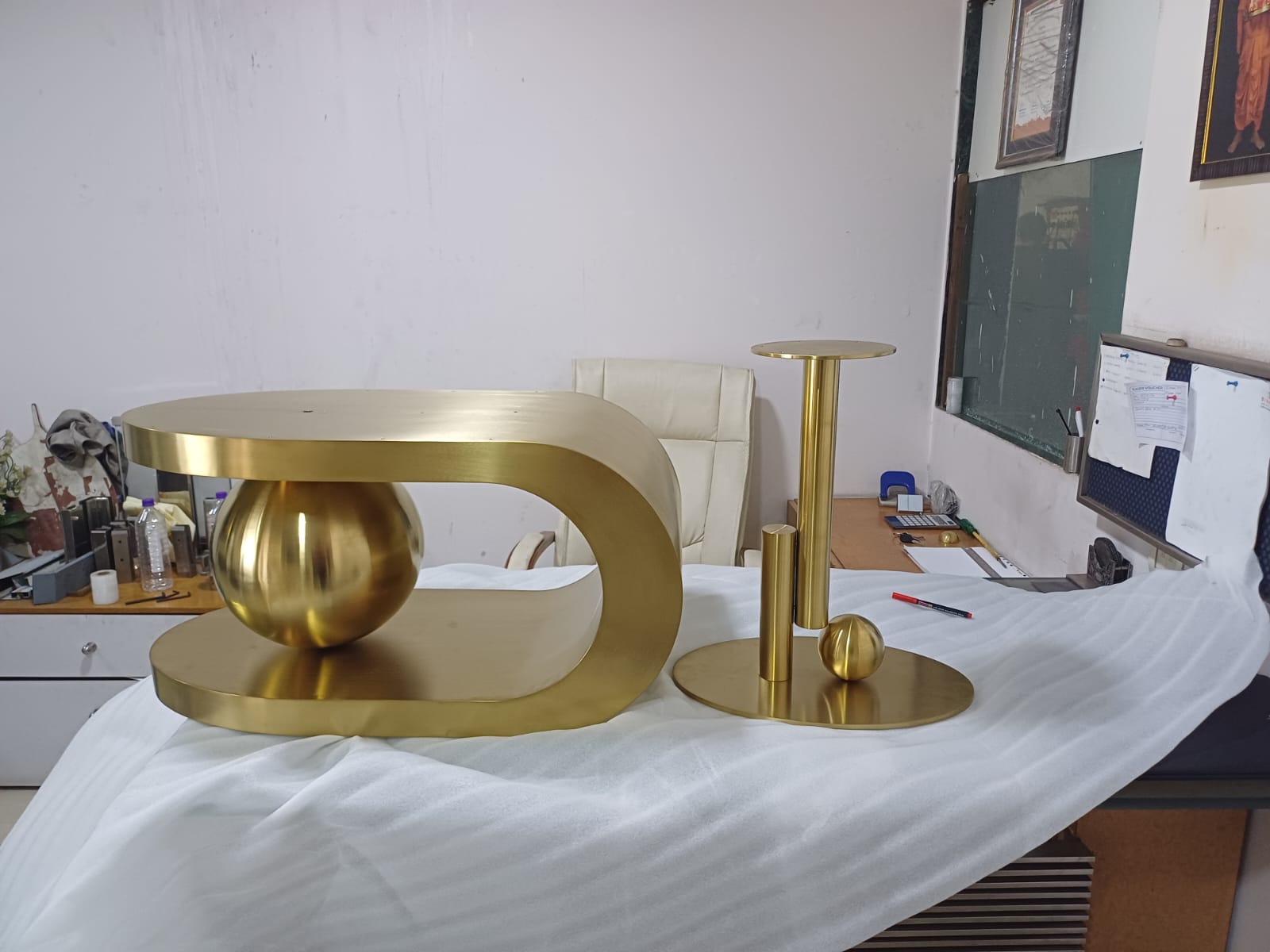 Brass sculptural furniture pieces by Moer