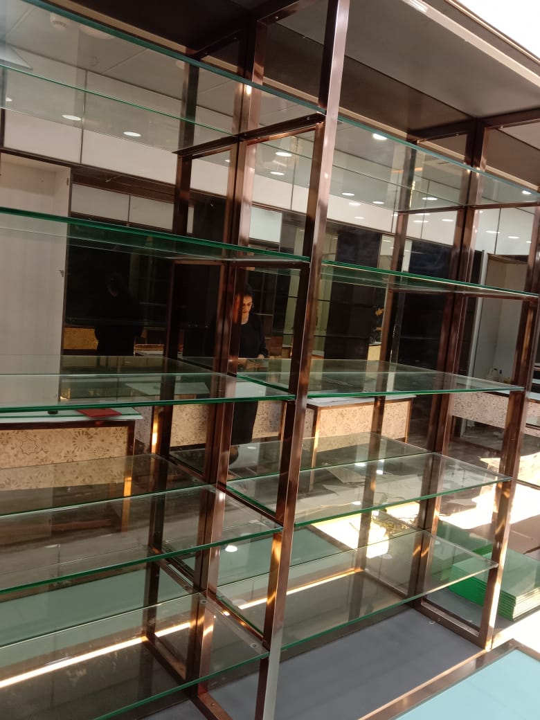 Rose-gold display shelving system